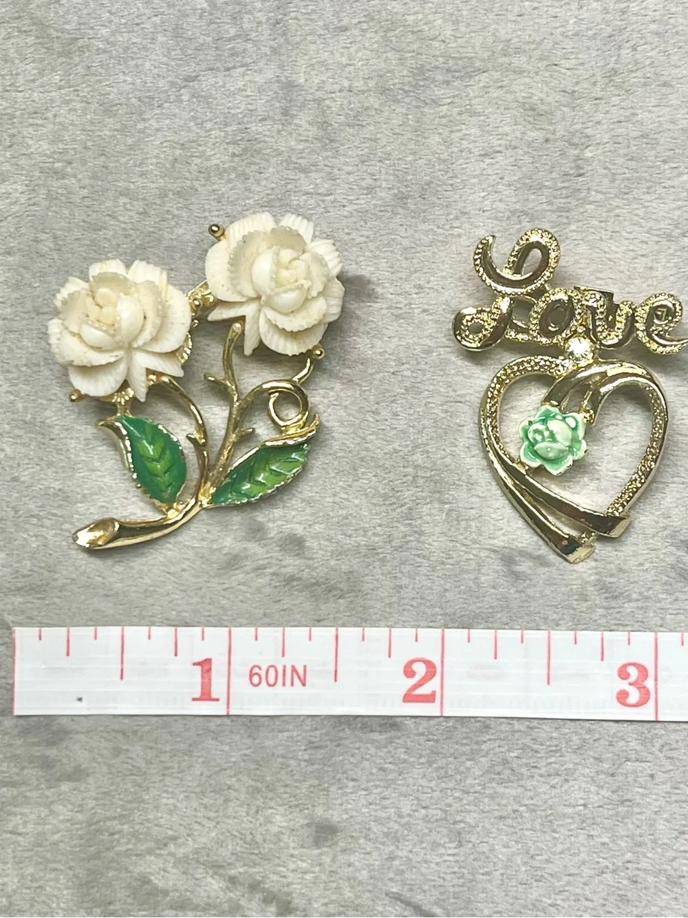Vintage gold tone brooch lot - white flower - love - green - signed Gerry’s